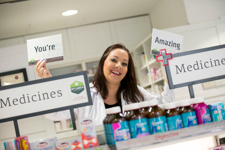 pharmacy worker smiling